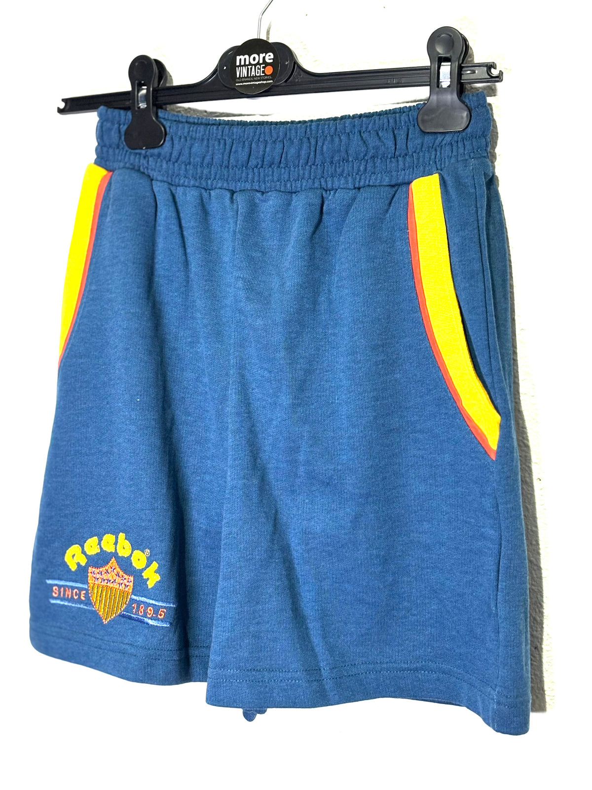Pantalón Corto Reebok “Since 1895” (prenda sin usar con etiqueta)